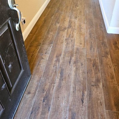 Luxury Vinyl Planks in Fort Worth - Flooring Direct's team of dedicated professionals installed beautiful wood-look luxury vinyl, in the color Chocolate from Lions Floor's Lone Star Spirit SPC Collection, in multiple rooms in a Fort Worth home.