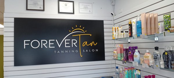 Our Tanning Salon Pictures - Forever Tan - Where Your Glow Begins!

Step into Forever Tan and experience a world of radiance! Our salon is a bright, vibrant, and beautiful oasis designed to provide you with the ultimate tanning experience. From the moment you walk through our doors, you'll be greeted by our friendly and knowledgeable staff, ready to help you achieve your perfect tan.

Our salon boasts state-of-the-art equipment, including the luxurious Matrix tanning bed, ensuring a flawless and even tan every time. We take pride in maintaining a clean and welcoming environment, where every visit feels like a mini getaway.

To enhance your experience, we offer exclusive deals like 50% off your first session and free birthday tanning! Our beautifully designed space, coupled with top-notch service, makes Forever Tan the go-to destination for all your tanning needs.

Come see why our customers rave about us and leave with a golden glow and a smile. Your journey to a beautiful tan starts here at Forever Tan!