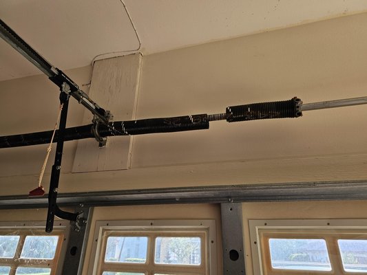 Broken Garage Door Spring - Have a Broken Garage Door spring, Call Evan’sGarageDoorService today at 204-230-8095 and we’ll
