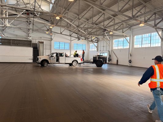 Asphalt Seal Coating Project – San Francisco Pier - For this project, our team completed a large-scale asphalt seal coating inside a warehouse facility located along a pier in San Francisco.

The space had experienced wear from heavy equipment and ongoing industrial use. We applied a fresh seal coat across the entire surface to restore the asphalt, improve durability, and provide long-term protection against moisture, traffic, and daily operations.

This project required careful coordination and precision to ensure a smooth, even finish across a wide indoor area. The end result is a clean, uniform surface that not only looks professional but is built to handle high-traffic conditions.

At JobCo Paving, we specialize in commercial and industrial paving projects of all sizes, delivering reliable results with attention to detail.

📍 San Francisco, CA
🛠 Services: Asphalt Seal Coating, Surface Restoration, Industrial Paving