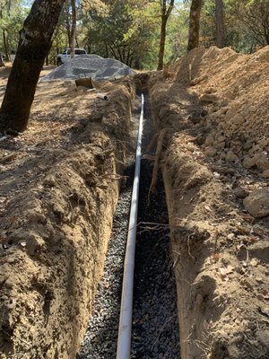 Leach Line Addition - This client's Septic system was sized for a 2 bedroom house originally and was needing to be increased to accommodate an additional bedroom. Taurian Construction completed the installation of approximately 220 linear feet of new leach line to solve this issue. Leach Line Addition - This client's Septic system was sized for a 2 bedroom house originally and was needing to be increased to accommodate an additional bedroom. Taurian Construction completed the installation of approximately 220 linear feet of new leach line to solve this issue.