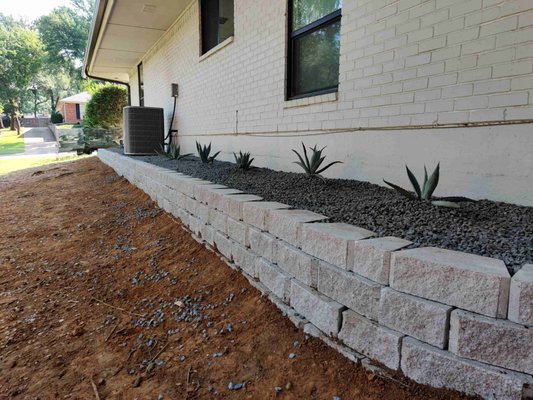 Texan Retaining wall - Check out this sleek Texan retaining wall we just completed! 🎉 Perfect blend of functionality and design to enhance your home's landscape. 🌿🏡 Texan Retaining wall - Check out this sleek Texan retaining wall we just completed! 🎉 Perfect blend of functionality and design to enhance your home's landscape. 🌿🏡