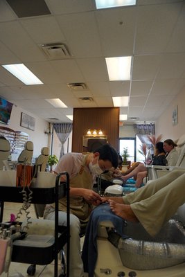 Busy Nail Salon Pedicure Service | Lafayette LA - Relaxing pedicure service in a clean, busy nail salon. Friendly and professional nail technicians ready to serve you. Clean, welcoming nail salon in Lafayette LA. Walk-ins welcome.