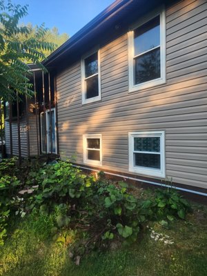 Replacement Vinyl Siding - This house removed the old siding and installed new wrap and vinyl siding, Install fascia Metal all the House Replacement Vinyl Siding - This house removed the old siding and installed new wrap and vinyl siding, Install fascia Metal all the House
