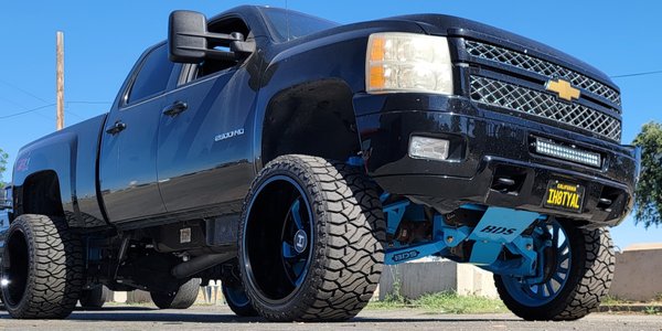2013 Chevy 2500 HD 6.5 " BDS Coilover Conversion lift kit - This 2013 2500HD Duramax truck got a huge transformation with this 6.5" Coil Over Conversion lift kit from BDS Suspension, upgraded steering and front end parts from Kryptonite Products, huge 24x14 Hostile wheels and a set of 35x14.50x24 Venom Power Tires. Top it all off with some custom powder coating.