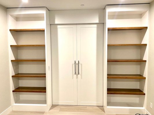 Bookshelves with Pocket Doors - This project was for another client looking to close off their home office. We created a wall of two sided book shelves complete with pocket doors for privacy during meetings. Bookshelves with Pocket Doors - This project was for another client looking to close off their home office. We created a wall of two sided book shelves complete with pocket doors for privacy during meetings.
