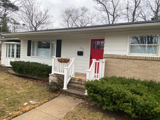 Exterior Overhaul - Northshore did the roofing and siding on this home in downtown Traverse City. Asphalt shingles followed up with a vinyl siding install.