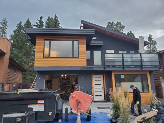 Canmore, Larch Ave Exterior Renovation - We completed this exterior reno project in September 2020, Canmore, AB. We removed the existing siding from the house and replaced it with conventional stucco system (sand & cement) and acrylic trowel on finish coat. Canmore, Larch Ave Exterior Renovation - We completed this exterior reno project in September 2020, Canmore, AB. We removed the existing siding from the house and replaced it with conventional stucco system (sand & cement) and acrylic trowel on finish coat.