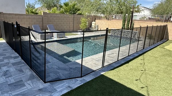 Pool Safety Fence Install - A newly installed pool safety fence brings peace of mind and protection to this backyard oasis. This secure barrier is a vital safety measure, helping prevent accidental access to the pool by young children and pets. Drowning is a leading cause of accidental death in children, and proper safety measures like this fence can make all the difference. Safety first—because every moment of fun should also be a moment of security.