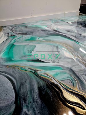 Custom green, gold, black and white metallic epoxy floor design. - Custom green, gold, black and white metallic epoxy floor design. Custom green, gold, black and white metallic epoxy floor design. - Custom green, gold, black and white metallic epoxy floor design.
