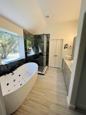 Bathroom remodels - This master bath was builder grade from 20 years ago. We gutted the entire bathroom bringing it to modern day elegance.