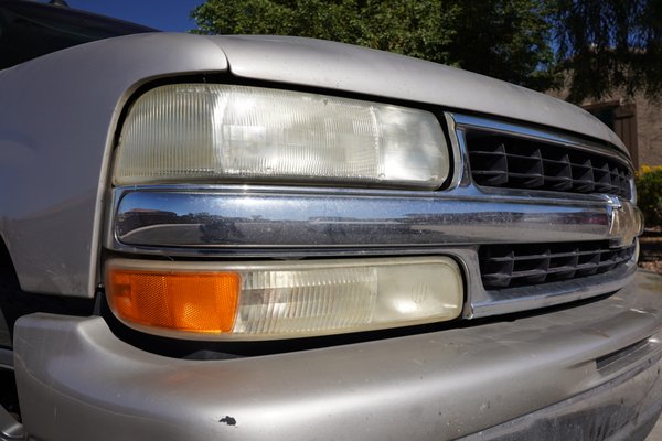 Chevy Tahoe Headlight and Trim Restoration - We restored this client's headlights, performed a rinse-less wash and brought the metal and plastic trim pieces back from the dead. What do you think? Chevy Tahoe Headlight and Trim Restoration - We restored this client's headlights, performed a rinse-less wash and brought the metal and plastic trim pieces back from the dead. What do you think?