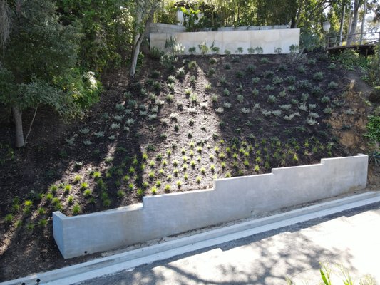 Two Retaining Walls Engineered and Built by Alpha Structural, Inc. - This project was done for a hillside that had a major landslide. We built a sister retaining wall at the top and another retaining wall at the bottom. Two Retaining Walls Engineered and Built by Alpha Structural, Inc. - This project was done for a hillside that had a major landslide. We built a sister retaining wall at the top and another retaining wall at the bottom.