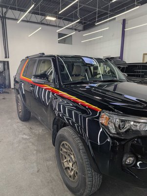 Custom Stripe Paint Protection Film Installation | PPF for Vintage Stripes in Chicago - This custom project came to Carrectly in Chicago after several shops declined the job due to the complexity of applying paint protection film over hand-installed vintage-style stripes. Because the stripes were custom and not factory-applied, this required precise hand-cutting and careful alignment to protect the surface without affecting the original design.

Unlike standard template-based PPF installation, this project required slow, detailed work with zero room for error. Our technicians carefully installed paint protection film around the custom lines, preserving the look while adding long-term protection against rock chips, scratches, and daily wear.

The result: the customer’s custom stripes remain fully visible and now have added protection to keep the finish looking sharp over time.

If you are looking for paint protection film in Chicago, custom PPF installation, or a shop experienced with specialty automotive protection projects, Carrectly provides precision work for both standard and highly custom applications.
