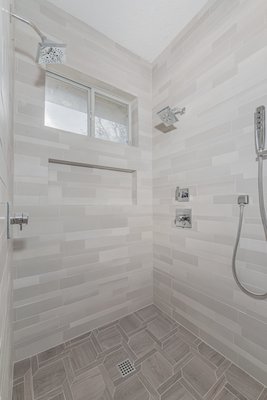 Bathroom Remodel - In our world, this is a familiar story: A couple, having lived with their builder-grade bathroom for years, decides it’s time for an upgrade to enhance functionality and style. They aimed to create a refreshed and modern space while ensuring it would be safe and accessible for them as they age. Bathroom Remodel - In our world, this is a familiar story: A couple, having lived with their builder-grade bathroom for years, decides it’s time for an upgrade to enhance functionality and style. They aimed to create a refreshed and modern space while ensuring it would be safe and accessible for them as they age.