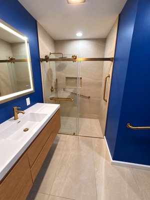 Irvine complete bathroom remodel. - This bathroom renovation was carefully designed by GIA Builders to meet the homeowners’ specific accessibility, safety, and storage needs. Because the homeowners required additional support and mobility assistance, we incorporated strategically placed safety grab bars throughout the bathroom, while maintaining a clean and functional layout. We also maximized storage to provide convenient space for their everyday needs without compromising the overall design.
The bathroom layout and functionality were designed by GIA Builders, while the blue wall the color selection was chosen by the homeowners to reflect their personal style and vision. Our goal was to create a space that was not only beautiful, but also safe, comfortable, accessible, and practical for their daily use.
At GIA Builders, we believe every renovation should be designed around the people who live in the home. Irvine complete bathroom remodel. - This bathroom renovation was carefully designed by GIA Builders to meet the homeowners’ specific accessibility, safety, and storage needs. Because the homeowners required additional support and mobility assistance, we incorporated strategically placed safety grab bars throughout the bathroom, while maintaining a clean and functional layout. We also maximized storage to provide convenient space for their everyday needs without compromising the overall design.
The bathroom layout and functionality were designed by GIA Builders, while the blue wall the color selection was chosen by the homeowners to reflect their personal style and vision. Our goal was to create a space that was not only beautiful, but also safe, comfortable, accessible, and practical for their daily use.
At GIA Builders, we believe every renovation should be designed around the people who live in the home.