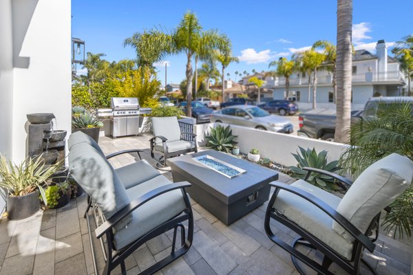 Seal Beach - Making the most out of the front yard and extending the interior of the house to the exterior was really important for this project. We maximized the space to create a wonderful setting for watching the sunsets, enjoying family time and interacting with neighbors. By elevating the space to one level and hardscaping we created a large patio area for relaxing, cooking and entertaining. Seal Beach - Making the most out of the front yard and extending the interior of the house to the exterior was really important for this project. We maximized the space to create a wonderful setting for watching the sunsets, enjoying family time and interacting with neighbors. By elevating the space to one level and hardscaping we created a large patio area for relaxing, cooking and entertaining.