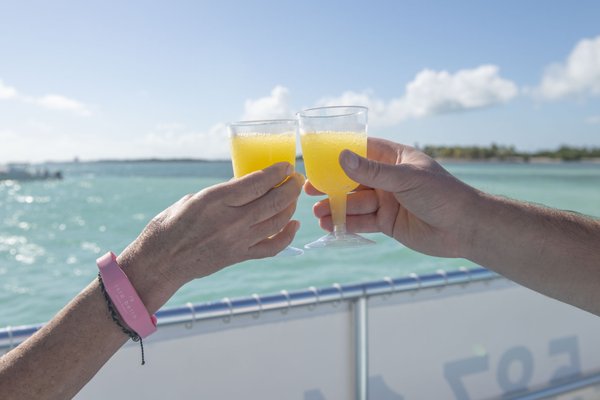 Morning Mimosa Cruise - This refreshing early-day adventure is the perfect way to ease into island time. Guests boarded SS Pops Island Tours for a scenic cruise through Marathon’s crystal-blue waters, enjoying complimentary mimosas as the sun sparkled across the ocean.

Midway through the trip, we stopped at a serene, shallow spot where guests could jump in for a relaxing swim, float in the warm Keys water, and take in the peaceful morning views. It’s a laid-back, fun way to cool off before the day heats up.

Whether celebrating a special occasion, kicking off vacation, or simply treating yourself to something unique, our Morning Mimosa Cruise sets the tone for an unforgettable Keys day. Guests lounged on deck, took photos, swam, and soaked up the serenity of being out on the water before the crowds arrived. It’s the ultimate way to say good morning — island style.