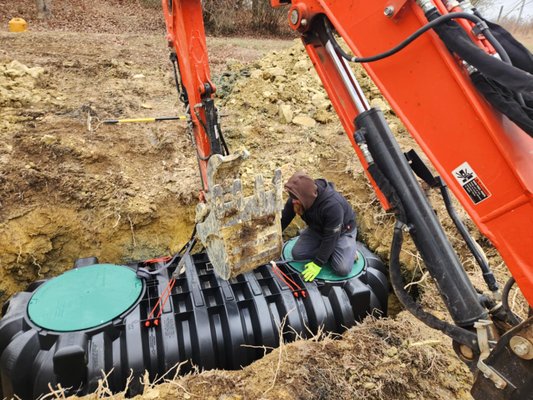 Septic Tank Installation - This septic tank was replaced because the original tank had cracked and was no longer functioning properly. We were able to replace the tank and tie into the existing drain lines on this project. Septic Tank Installation - This septic tank was replaced because the original tank had cracked and was no longer functioning properly. We were able to replace the tank and tie into the existing drain lines on this project.