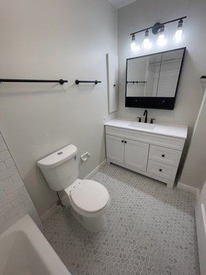 bathroom remodel in 2023 - this bathroom was in dire need of an update..by replacing the tiles, paint and other fixtures we transformed this bathroom from dingy, crusty yellow walls to stunning, clean white shower tiles with a warm, agreeable grey color scheme. Preforming this beautiful remodel was a breeze for our team at Reimagined Spaces. Call today! bathroom remodel in 2023 - this bathroom was in dire need of an update..by replacing the tiles, paint and other fixtures we transformed this bathroom from dingy, crusty yellow walls to stunning, clean white shower tiles with a warm, agreeable grey color scheme. Preforming this beautiful remodel was a breeze for our team at Reimagined Spaces. Call today!