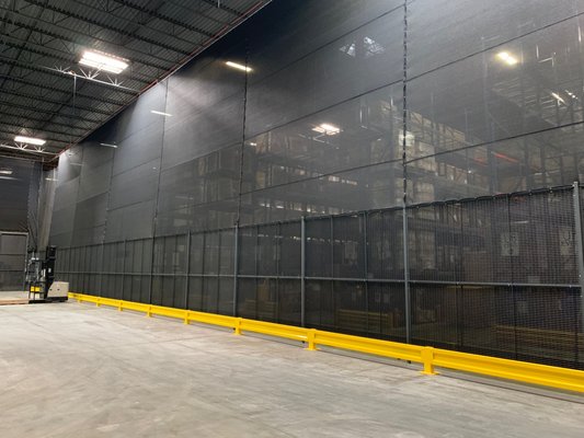 87% Mesh Divider Tarp - We work with many diverse businesses that require tarps for specialized applications. Our customer’s 87% mesh tarp was skillfully utilized as a wall divider, creating separate spaces in a versatile and stylish manner. The mesh tarp, crafted for such applications, features a finely woven pattern that allows for optimal airflow while providing privacy and visual separation. Its lightweight yet durable composition ensures easy installation and long-lasting performance.