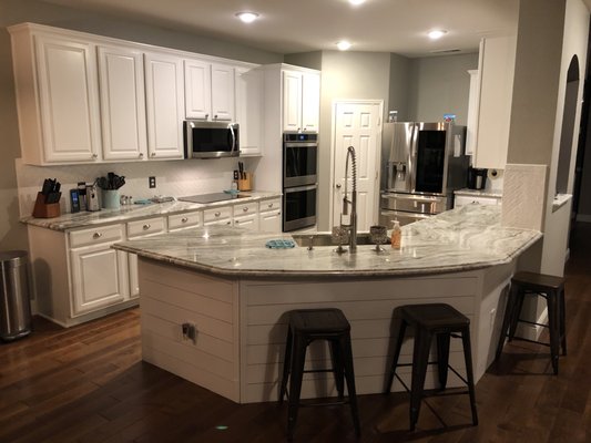 Kitchen counter tops and backsplash in Corinth - Fantasy Brown granite with 3x9 subway tile installed on herringbone pattern Kitchen counter tops and backsplash in Corinth - Fantasy Brown granite with 3x9 subway tile installed on herringbone pattern