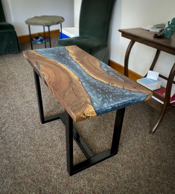 Custom Fabricated Red Walnut Live Edge Epoxy Resin River Table - Custom Fabricated Red Walnut Live Edge Epoxy Resin River End Table, expertly handcrafted by MK Custom Creatives. We take immense pride in crafting each piece with love and care. Our items are handmade using traditional techniques, ensuring that every piece is truly unique with its own special variations in color, texture, and size. These small differences are what make our products authentically yours! We appreciate the charm these subtle variations bring, as they showcase the artist's touch and the beauty of handcrafted ceramics, woodworking, and welded materials.
This product is Available for purchase! Please feel free to contact us! Custom Fabricated Red Walnut Live Edge Epoxy Resin River Table - Custom Fabricated Red Walnut Live Edge Epoxy Resin River End Table, expertly handcrafted by MK Custom Creatives. We take immense pride in crafting each piece with love and care. Our items are handmade using traditional techniques, ensuring that every piece is truly unique with its own special variations in color, texture, and size. These small differences are what make our products authentically yours! We appreciate the charm these subtle variations bring, as they showcase the artist's touch and the beauty of handcrafted ceramics, woodworking, and welded materials.
This product is Available for purchase! Please feel free to contact us!