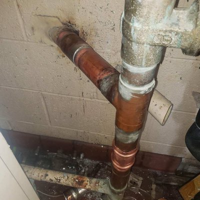 2 Inch Emergency Water Main Repair - The original water line was leaking. With our 24 hours services, we're able to fix the water line before any damage occurred.