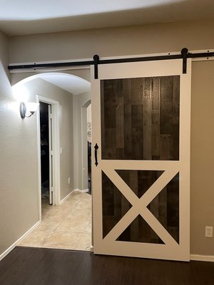 Custom Barn Door Collection - This portfolio showcases a diverse array of custom barn doors, each expertly crafted from high-quality real wood to deliver both durability and timeless beauty. Designed for clients seeking unique solutions that make a statement, these barn doors elevate interiors with a blend of rustic charm and modern functionality.
From classic paneled designs to bold geometric patterns and minimalist styles, every barn door is tailored to complement the unique character of each space. Hardware selections and finish options are carefully curated in collaboration with clients, ensuring each piece seamlessly integrates with existing decor.
More than just a space-saving entry solution, these sliding barn doors act as stunning centerpieces—bringing warmth, character, and natural elegance to any room. Each project in this collection highlights our commitment to craftsmanship, customization, and the enduring appeal of real wood. Custom Barn Door Collection - This portfolio showcases a diverse array of custom barn doors, each expertly crafted from high-quality real wood to deliver both durability and timeless beauty. Designed for clients seeking unique solutions that make a statement, these barn doors elevate interiors with a blend of rustic charm and modern functionality.
From classic paneled designs to bold geometric patterns and minimalist styles, every barn door is tailored to complement the unique character of each space. Hardware selections and finish options are carefully curated in collaboration with clients, ensuring each piece seamlessly integrates with existing decor.
More than just a space-saving entry solution, these sliding barn doors act as stunning centerpieces—bringing warmth, character, and natural elegance to any room. Each project in this collection highlights our commitment to craftsmanship, customization, and the enduring appeal of real wood.