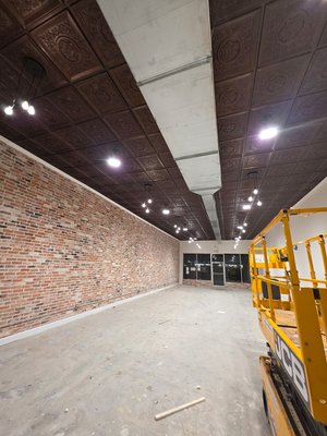 Full remodel and rewire of historical building done in 4 days with 3 man crew everything done as customer request and approval. - replaced all the plugs switches conduit ceiling for the remodel and installed lights controlled by dimmer with the exit signs in the right plaeces for the remodel.