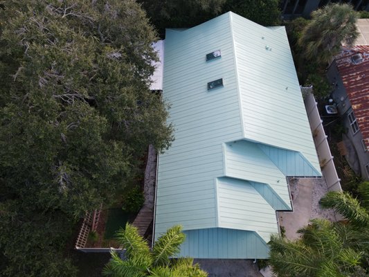 New metal roof installation in Safety Harbor - This project was to remove and replace an existing metal roof. The underlying decking had significant damage from previous leaks, and as a result required 14 sheets of plywood decking, and a lot of truss work to restore the structural integrity of the house. New metal roof installation in Safety Harbor - This project was to remove and replace an existing metal roof. The underlying decking had significant damage from previous leaks, and as a result required 14 sheets of plywood decking, and a lot of truss work to restore the structural integrity of the house.