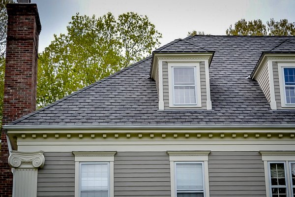 Custom Shingle Project - This roof was done on a home built in the 1800's and the homeowner wanted the roof to be as special as the remodel. We installed 3 different grey Architectural shingles to give the appearance of an aged look that will last 50 years, take that Bob Villa! Just kidding we love This Old House! Custom Shingle Project - This roof was done on a home built in the 1800's and the homeowner wanted the roof to be as special as the remodel. We installed 3 different grey Architectural shingles to give the appearance of an aged look that will last 50 years, take that Bob Villa! Just kidding we love This Old House!