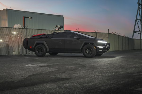 Tesla Cybertruck INVINCIBLE - A cohesively designed and engineered complete package of ultra-tough upgrades inside and out. Fortified with our proprietary components, enhancing the Cybertruck’s ability to handle the most challenging terrains and situations. Plastic becomes steel, cast becomes forged, and weaknesses become strengths. The truck is for driving through any obstacle in your path.