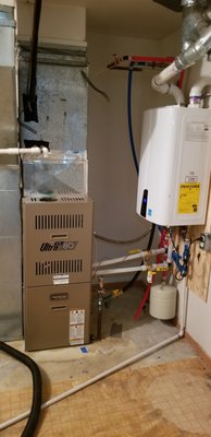 Tankless Integrated Heating - A furnace can be converted to a powerful, efficient space heating appliance without throwing your old furnace in a landfill! Tankless water heaters made to create space heat can be connected to your existing furnace with some modifications. The best way to create comfort, simplicity and energy efficiency in your home is available today for half the price of an equivalent conventional furnace.