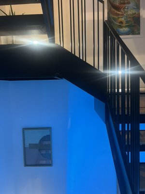 installed staircase light inside the appartment. - this project was suggested by the client, and the backlight can be adjusted for brightness and color, macing it convenient to use at any time of day .