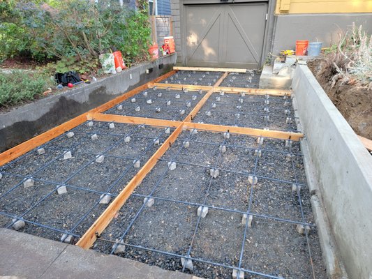 Concrete and Masonry - As a full-service exterior general contractor, we do concrete slabs, retaining walls, footers and more. We also do stonework, brick and chimney repair.