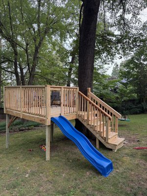 Kids Back Yard Playdeck - This back yard play deck was designed and build by My Home Project Pro and it includes a 10 x 10 observation deck big enough to build a club house on a slide and rock climbing wall. Even large enough for a table and chairs for the parents to hang out and watch the kids as they play! Kids Back Yard Playdeck - This back yard play deck was designed and build by My Home Project Pro and it includes a 10 x 10 observation deck big enough to build a club house on a slide and rock climbing wall. Even large enough for a table and chairs for the parents to hang out and watch the kids as they play!