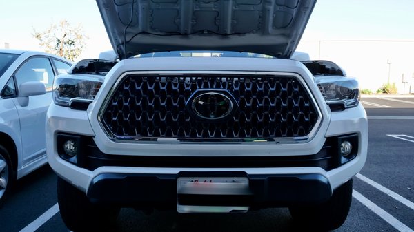 3rd GEN Tacoma TRD PRO Grill with Garnish Cover, Raptor Lights, and Tri-Color Black Badge Emblem. - This project was applied on a 2019 Tacoma SR5, our first on hand project on modifications with the vehicle, it took less than one and a half hours for the whole installation process. For more informations, feel free to call us at  909-612-7540!

Tools: 
10mm socket
screwdriver
crimp (for raptor lights)

Video:https://www.youtube.com/watch?v=rsgJf7_PruM&t=1s