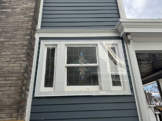 Covering the old window with plexiglass - This is a job to install a plexiglass to protect the old window from wind and water