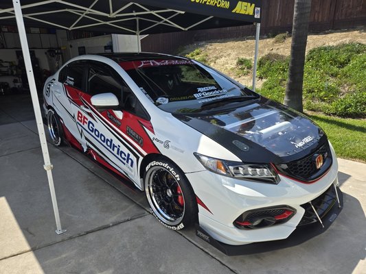 Showroom Ready - We had the pleasure to work on this one of a kind Honda Civic. This vehicle was featured at the SEMA show Las Vegas in 2019. It has won over 20 car show trophies and many more to come. In this project we started by removing some decals and polished off the residue. We then applied a premium ceramic coating to all exterior surfaces. The interior was also detailed and made sure all areas were showroom ready.