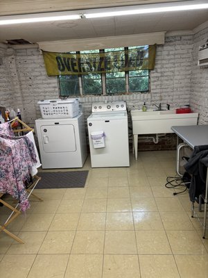 Laundry Room Declutter - This laundry room was so cluttered and dirty that the owners dreaded doing their laundry. After the work was done, the owners of the home were so delighted and happy that they not only had the space to store items but to wash, dry, fold and hang their clothes.