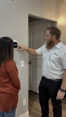 Consulting with homeowner - We visited a Utah homeowner to discuss HVAC solutions.