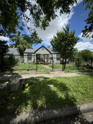 Metal fence and pedestrian gate - Before this project, there was a gray chain link fence with no pedestrian gate. Client called us to fabricate and install metal gate with pedestrian gate for easy access to front home entry.