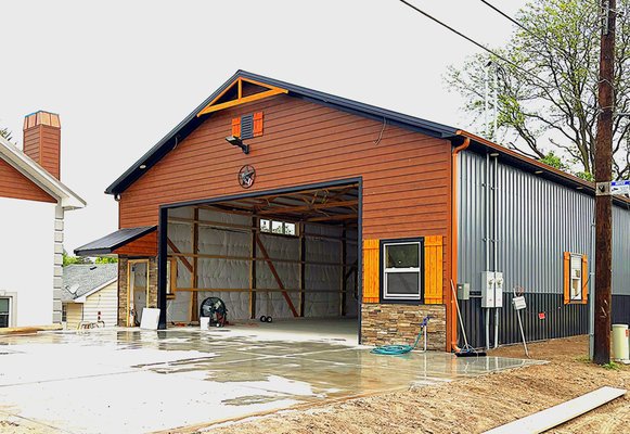 Garage floor and drive way - This project was a garage floor, and the garage driveway and measured a total of 80 feet by 40 feet and had thickness of 5 inches and was done in Beloit KS. This costumer wanted something durable to store his big construction equipment like a skid steers and dump trailers.