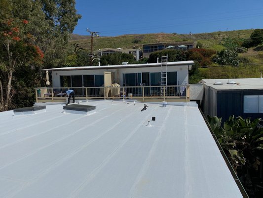 Flat Roof Replacement - If you're considering a roof replacement for your Los Angeles home, a flat roof might be the perfect solution. Here are some compelling benefits of choosing a flat roof replacement in LA:
Modern Aesthetic: Flat roofs offer a sleek, contemporary look that complements many architectural styles. They provide a clean, streamlined appearance that enhances the overall design of your home.
Versatility: Flat roofs are ideal for creating additional outdoor living spaces, such as rooftop gardens, patios, or solar panel installations. They offer functional space that can be utilized in various ways.
Energy Efficiency: Flat roofs can be equipped with reflective coatings and insulation materials that help keep your home cooler during Los Angeles' hot summers, potentially reducing your energy bills.
Easy Maintenance: With a flat roof, accessing and inspecting your roof is simpler and safer. Routine maintenance and repairs are more straightforward, which can lead to longer-lasting performance.
Cost-Effective: Flat roofs often have lower installation and material costs compared to pitched roofs, making them a budget-friendly option for homeowners looking to maximize their investment.
Durability: Modern flat roofing materials, such as TPO, EPDM, and modified bitumen, are designed to withstand LA's sun and occasional rain. They offer excellent durability and resistance to weathering. Flat Roof Replacement - If you're considering a roof replacement for your Los Angeles home, a flat roof might be the perfect solution. Here are some compelling benefits of choosing a flat roof replacement in LA:
Modern Aesthetic: Flat roofs offer a sleek, contemporary look that complements many architectural styles. They provide a clean, streamlined appearance that enhances the overall design of your home.
Versatility: Flat roofs are ideal for creating additional outdoor living spaces, such as rooftop gardens, patios, or solar panel installations. They offer functional space that can be utilized in various ways.
Energy Efficiency: Flat roofs can be equipped with reflective coatings and insulation materials that help keep your home cooler during Los Angeles' hot summers, potentially reducing your energy bills.
Easy Maintenance: With a flat roof, accessing and inspecting your roof is simpler and safer. Routine maintenance and repairs are more straightforward, which can lead to longer-lasting performance.
Cost-Effective: Flat roofs often have lower installation and material costs compared to pitched roofs, making them a budget-friendly option for homeowners looking to maximize their investment.
Durability: Modern flat roofing materials, such as TPO, EPDM, and modified bitumen, are designed to withstand LA's sun and occasional rain. They offer excellent durability and resistance to weathering.