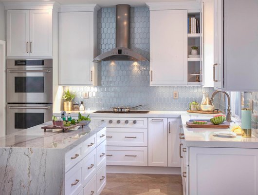 White Shaker - Shaker styled kitchen cabinets have sleek clean lines with very little adornment or ornamentation. This style blends perfectly with a traditional or modern looking kitchen. You can play with the color palette by adding a glass backsplash White Shaker - Shaker styled kitchen cabinets have sleek clean lines with very little adornment or ornamentation. This style blends perfectly with a traditional or modern looking kitchen. You can play with the color palette by adding a glass backsplash