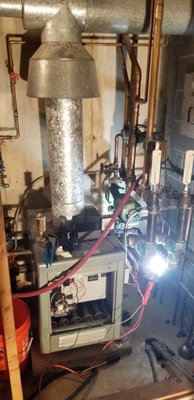 Boiler Installation - Old cast iron boiler for low heat radiant system @ almost 200,000 BTUH upgrade to Laars low heat hybrid boiler system with 3 zones. Boiler Installation - Old cast iron boiler for low heat radiant system @ almost 200,000 BTUH upgrade to Laars low heat hybrid boiler system with 3 zones.