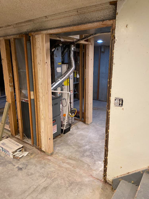 Basement complete framing - We added a bedroom, bathroom, door frames, closets to a basement space adding more rooms and structure making it a more livable area
