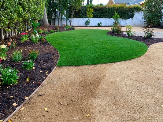 Studio City Backyard Makeover - This project replaced a plain of turf. The design resulted in a new space full of texture and dimension by adding curvylinearity to the exiting square shape of the backyard. Studio City Backyard Makeover - This project replaced a plain of turf. The design resulted in a new space full of texture and dimension by adding curvylinearity to the exiting square shape of the backyard.