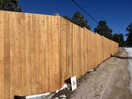 8' Privacy Fence - This beautiful cedar privacy fence in Black Forest was built 8 feet tall with dual automatic gates. 8' Privacy Fence - This beautiful cedar privacy fence in Black Forest was built 8 feet tall with dual automatic gates.